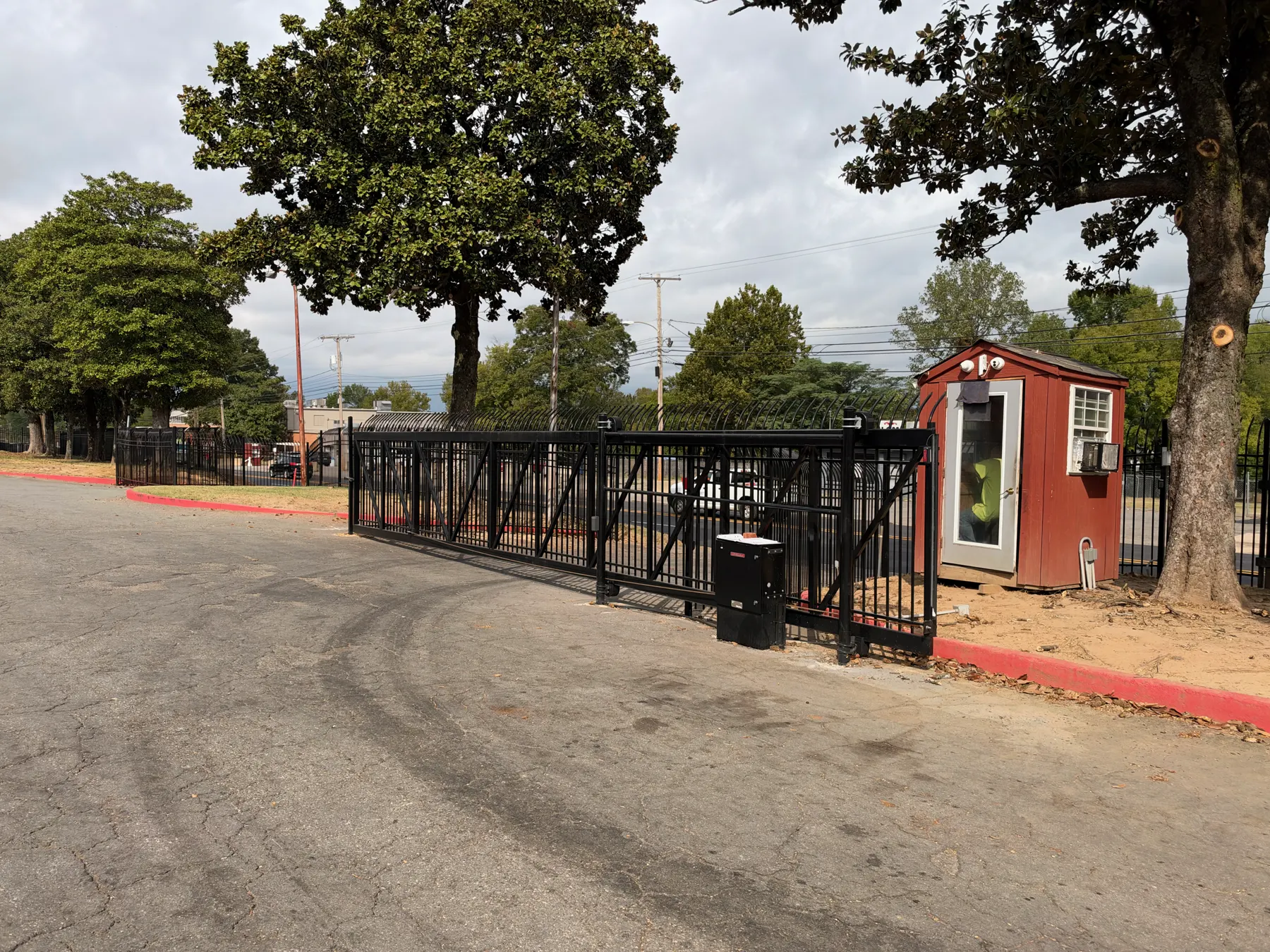 Front gate and guard booth at the Magnolia campus entrance