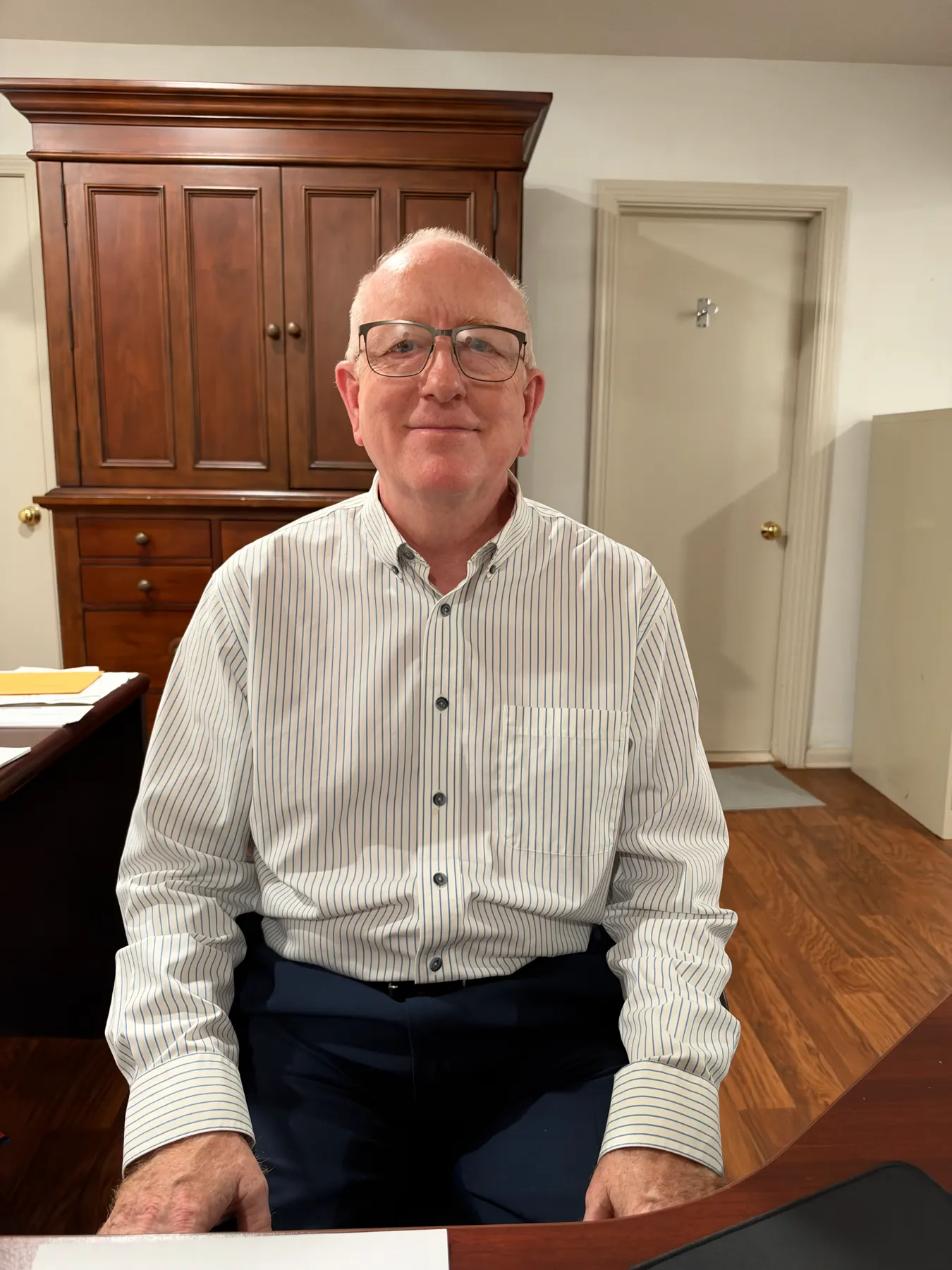 Mark Pruitt seated at his desk